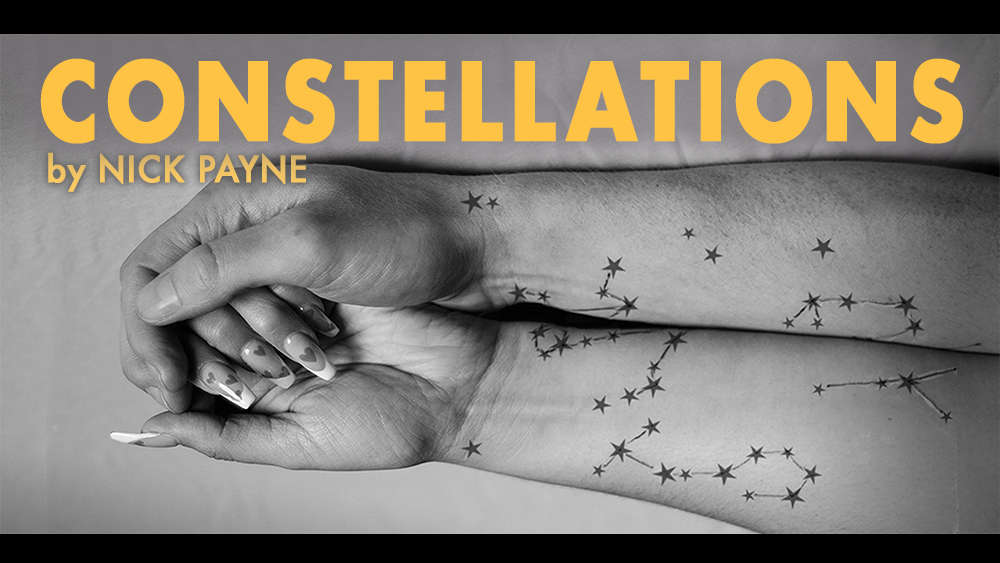 Arms with star tattoos