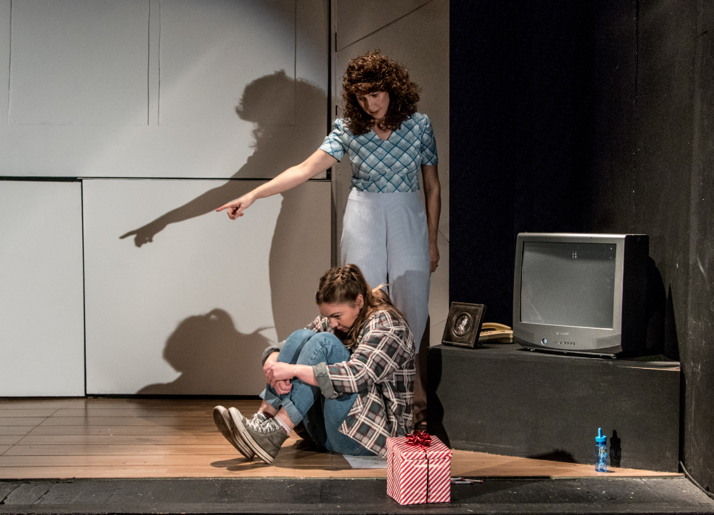 Bex Fey as Teacher and Julia Langley as Elizabeth