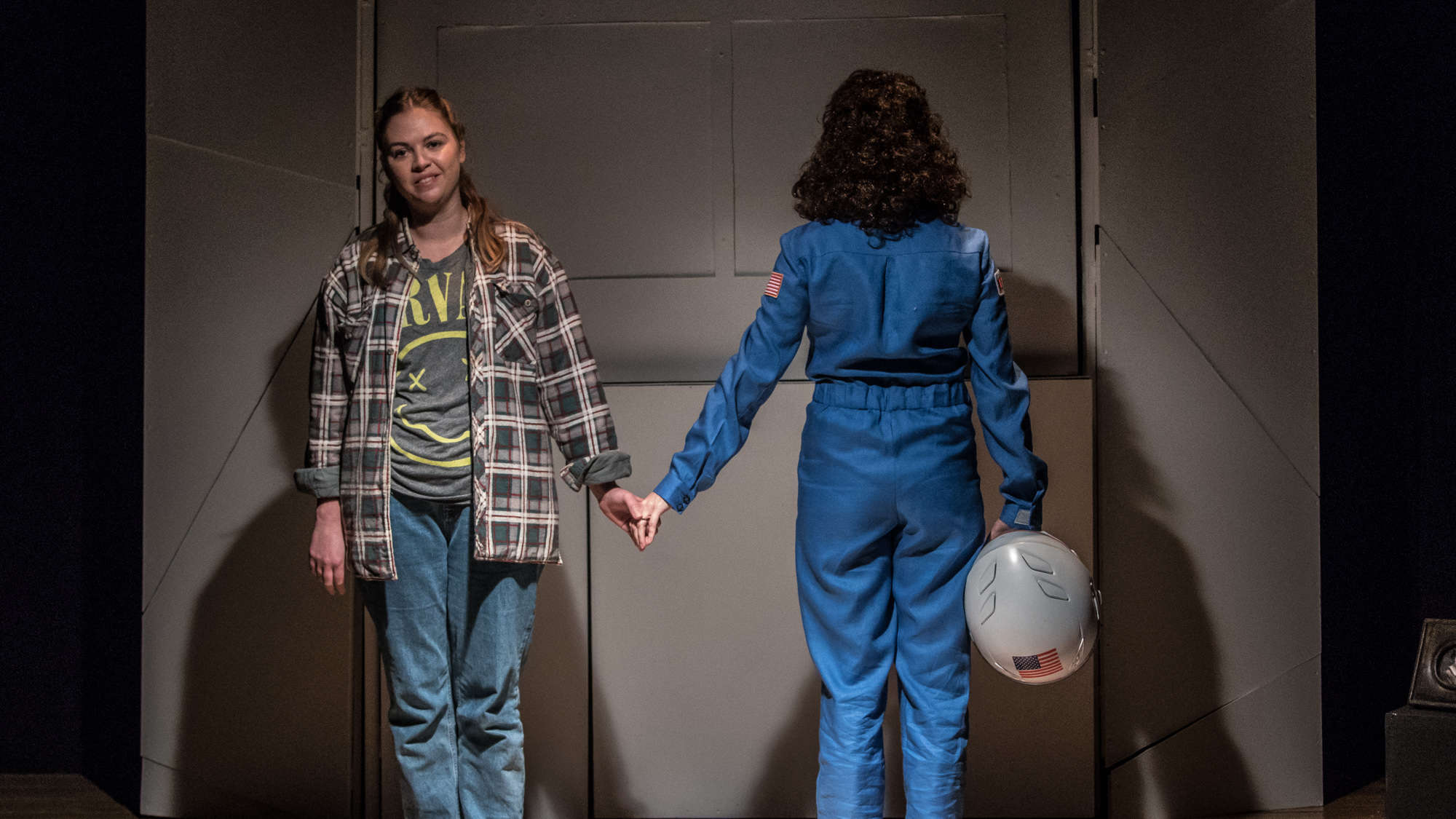 Elizabeth and Teacher in a scene from the play.